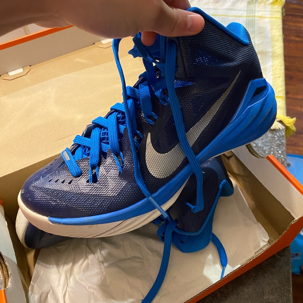 Blue Nike basketball high top shoes